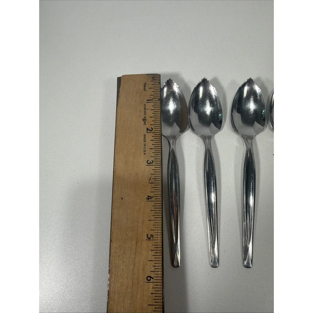 5pc. lot of Vintage Wm. Rogers & Son Serrated Spoon